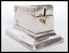 An early 20th Century Edwardian hallmarked silver table top double cigar cutter by Alexander Clark &