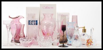 A collection of vintage retro 20th Century studio glass predominately by Caithness, some retaining