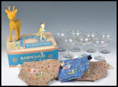 A collection of vintage retro 20th Century Babycham advertising items to include a boxed set of