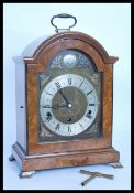 A 20th Century walnut veneered Elliot 8 Day lever Westminster & Whittington chime clock of square