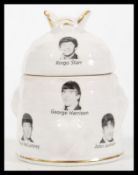 An unusual 20th Century Beatles advertising honey pot having bee finial lid. The pot decorated