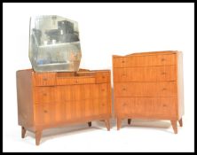 A vintage 20th Century Art Deco walnut veneered bedroom suite consisting of a chest of drawers and
