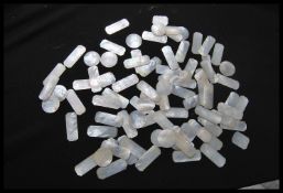 A group of 19th Century Chinese mother of pearl gaming tokens of octagonal and roundel form. Most