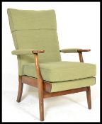 A vintage retro Parker Knoll model 732 open framed armchair, sweeping arms with loose upholstered