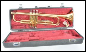 Musical Instruments. A good modern Yamaha trumpet complete in the original carry case. Measures 49cm