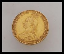 A 1987 Victorian London mint full gold sovereign having the old head of Victoria facing left. Weight