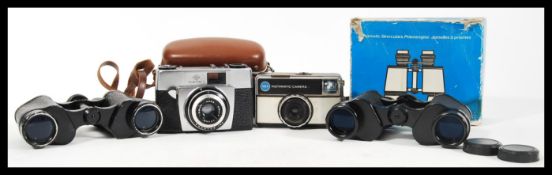 A pair of vintage binoculars to include lizars Clyde 8x30 and a Observer 8x30 together with two