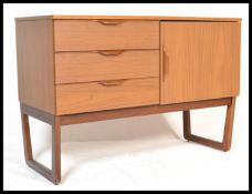 A retro vintage 20th century small proportion  teak wood veneer having a tree draws to the left