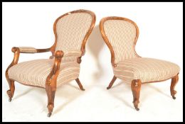 A pair of 20th Century ladies and gentleman's walnut framed, spoon back nursing chairs with carved