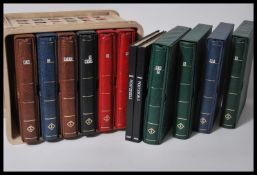 A large collection of world stamps across twelve albums, mostly including post decimal examples,