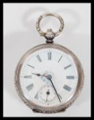 A continental silver 800 pocket fob watch having a white enamel face with Roman numeral chapter ring