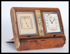 An early 20th Century Art Deco, folding desk top compendium clock and barometer by Cartier, the