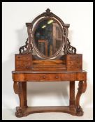 A 19th Century Victorian burr walnut Duchess dressing table raised on scrolled legs with oval
