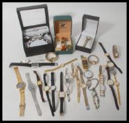 A 20th Century silver continental open faced pocket watch, enamel face with Roman numeral chapter