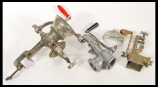 A group of three vintage retro 20th Century kitchen / industrial kitchenalia grinders to include a