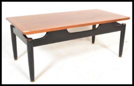 A vintage retro mid 20th Century G Plan coffee table in the Lebrenza pattern raised on ebonised base