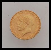 A 1926 half sovereign with George V facing left. Weight 4.0g.
