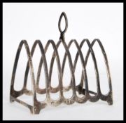 An early 20th Century hallmarked silver large six section toast rack by S Blanckensee & Son Ltd