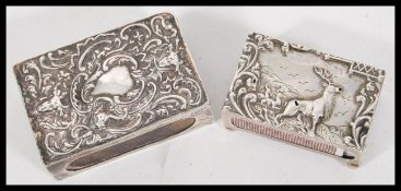 Two early 20th Century Edwardian hallmarked silver matchbox covers or boxes to include an example by