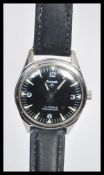 A vintage style Hunt military watch having a luminous black dial with luminous numerals. The 17