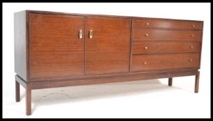 A vintage 20th century sideboard having graduation bank of draws to the left and double doors on the