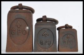 A graduating set of GPO military weights having GPO and military crows foot stamps present. The