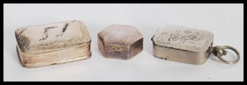 A group of three pill boxes one being a sterling silver 925 example of hexagonal form, hallmarked