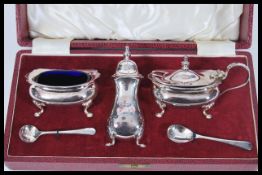 A vintage 20th Century Walker and Hall silver plated condiment cruet set complete in original box