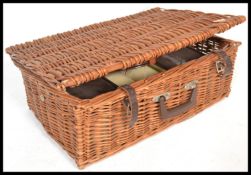A vintage 20th Century vinyl cased Brexton picnic hamper set, all original contents within to