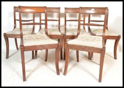 A set of six early Century bar back mahogany dining chairs, each with a rope twist back and drop