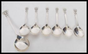 A collection of seven 20th century Sheffield hallmarked silver spoons by Harrison Brothers &