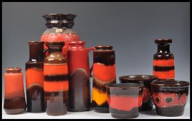 A collection of vintage retro 20th Century West German fat lava style pottery all in a flambe type