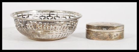 A silver hallmarked fret pierced peanut dish, Birmingham assay, dating to 1939, makers mark for