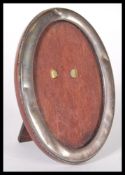 A silver hallmarked mahogany backed easel mirror o