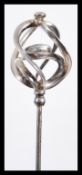 An early 20th Century Edwardian Charles Horner silver finial hat pin having a twisted helix design