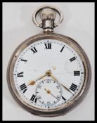 A 20th Century silver hallmarked open face pocket watch, having a white enamelled face with roman