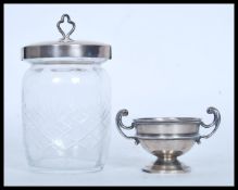 A silver hallmarked Henry Symes Shorland Fooks table salt bowl raised on a circular base with twin