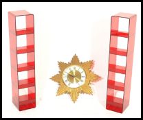 A pair of vintage retro 20th Century red acrylic display stands of rectangular form having five