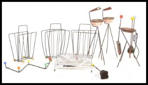 A collection of retro 20th Century atomic metal items, to include magazine racks, ash trays, coat