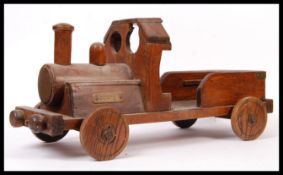 VINTAGE CARVED WOODEN HAND MADE PUSH ALONG TRAIN LOCO