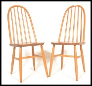 A pair of 20th Century Ercol Windsor style Priory Quaker hoop-b