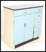 A vintage mid 20th Century two tone kitchen cupboard / sideboard, having a configuration of
