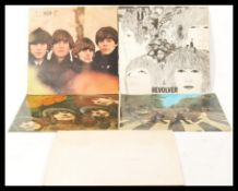 A collection of long play LP vinyl records pertaining to The Beatles to include The White Album #