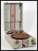 A vintage early 20th Century portable picnic gramophone by Triumph in black leatherette case.