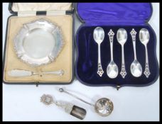 A group of silver and silverplate to include a cased set of five hallmarked tea spoons, hallmarked
