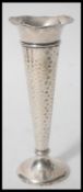 An early 20th Century hallmarked silver trumpet vase / spill vase by William Comyns & Sons raised on