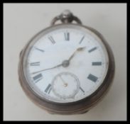 An early 20th Century hallmarked silver Chester pocket watch having a white enamel face with Roman