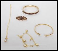 A selection of silver vermeil jewellery to include stamped 925 silver vermeil bangle bracelet set