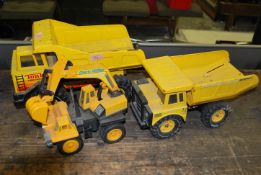 A group of three vintage Tonka truck toys to include a Giant Digger DFJ191, a Tonka turbo diesel