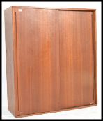 A mid century, retro teak wood school cupboard / office cabinet having a tambour front pair of
